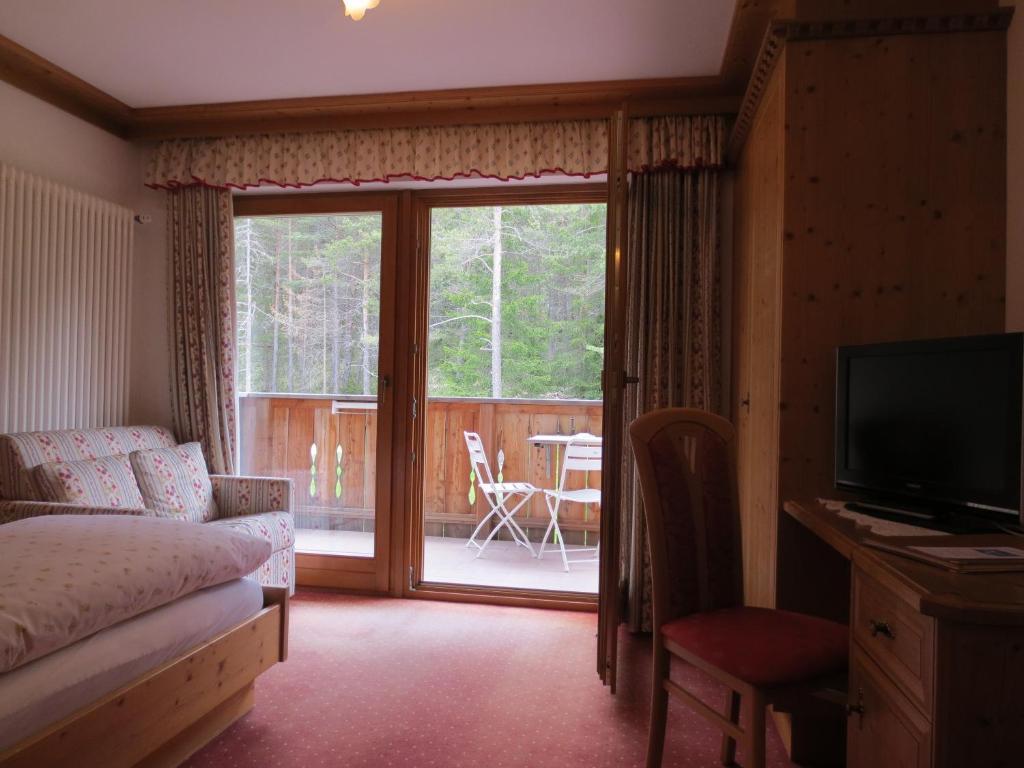 Hotel Ciasa Ai Pini St. Kassian Zimmer foto